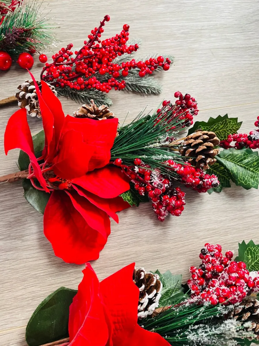 Collection of artificial red poinsettia and berry - Image 2