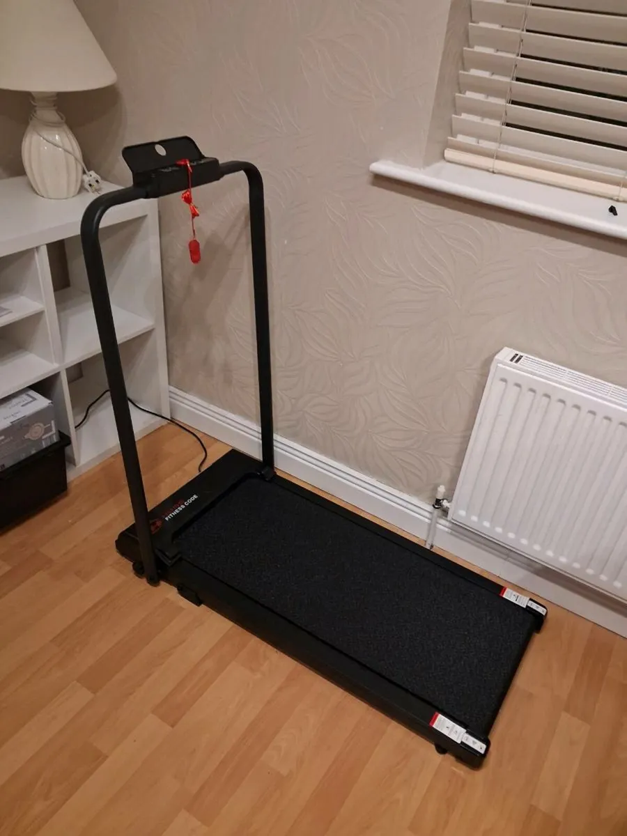 Walking pad with hand rail