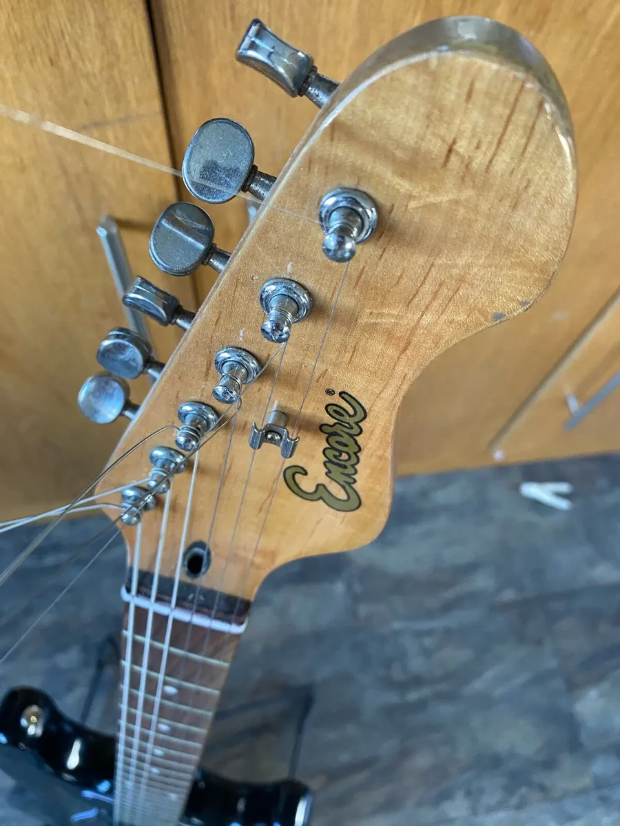 Encore electric guitar with stand and tuner - Image 2