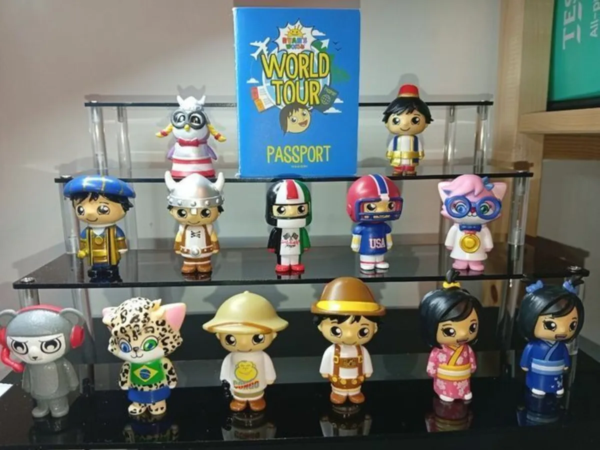 Collection of Ryans World tour figures + passport