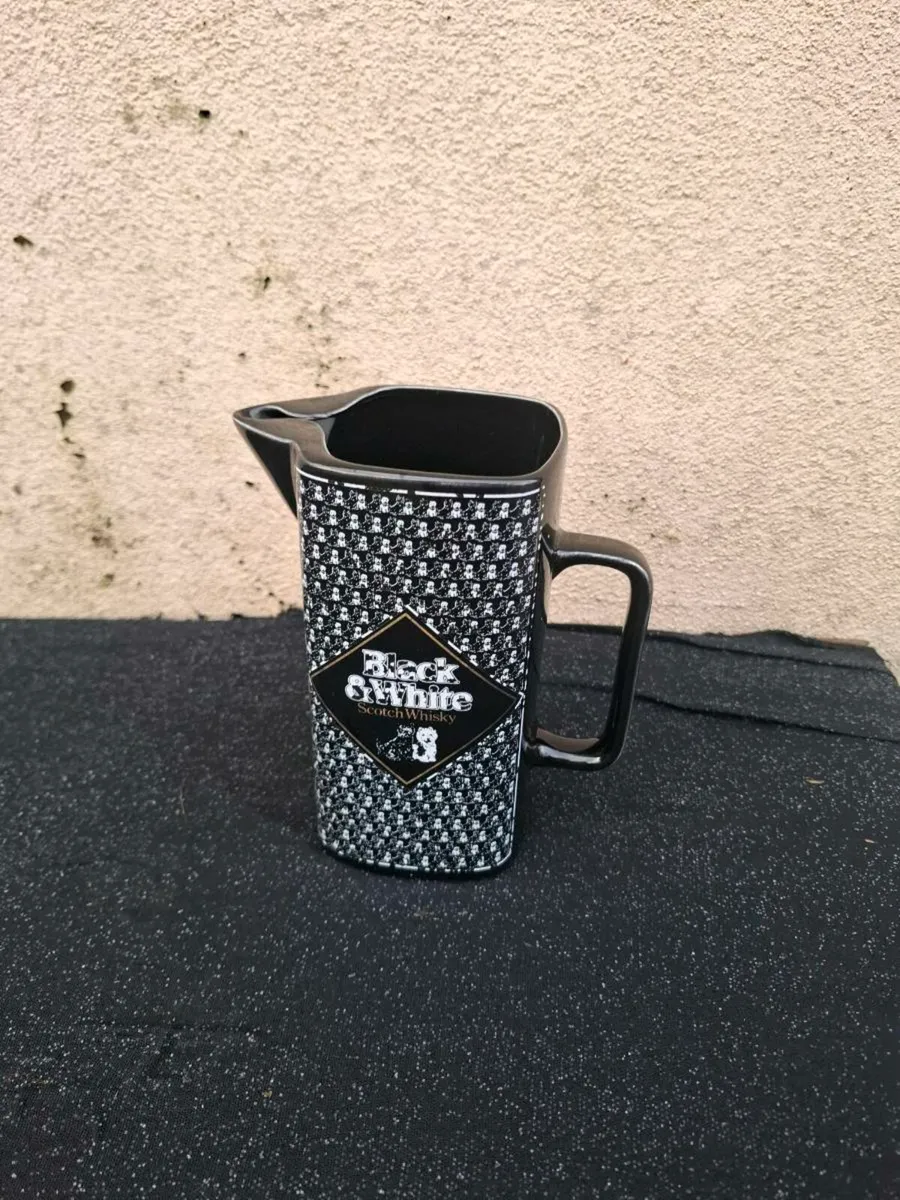 Black and white whiskey pitcher postage possible
