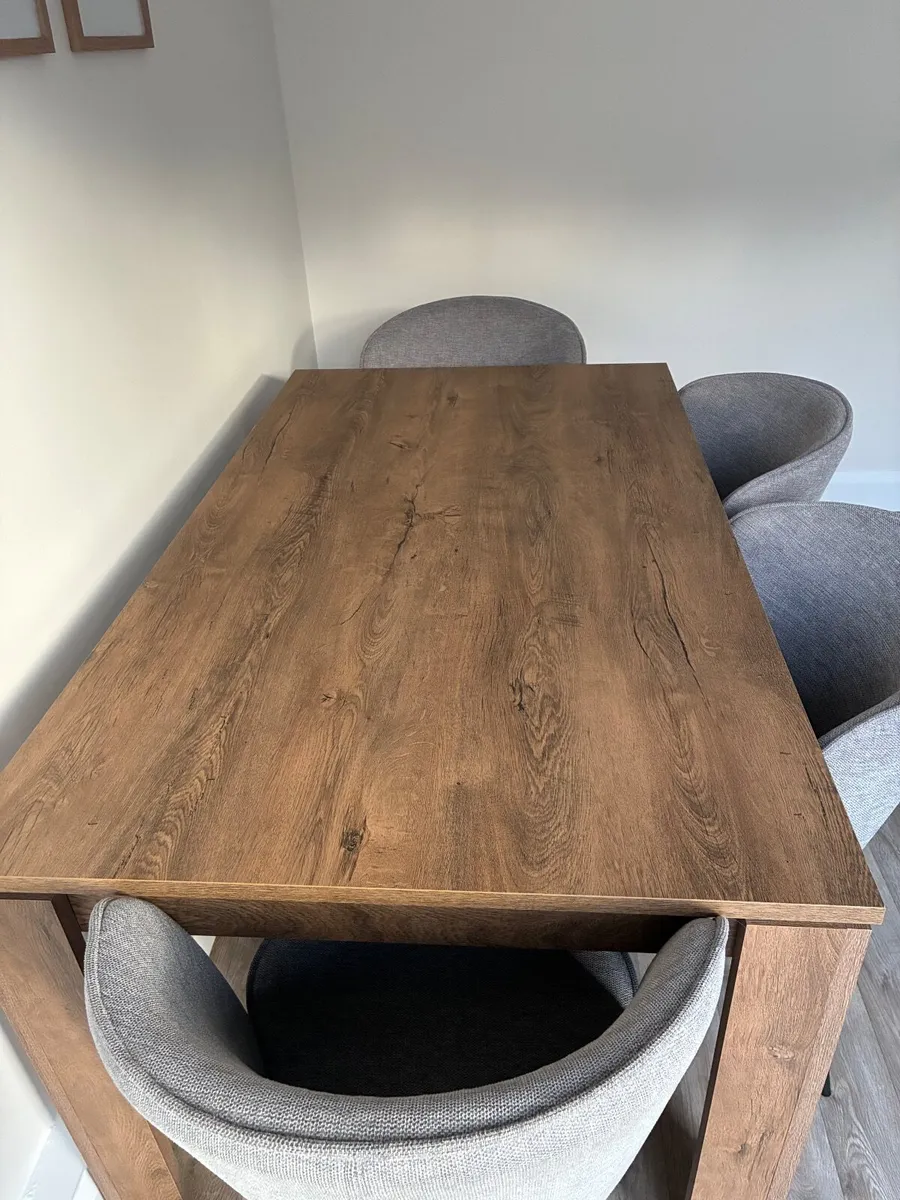 JYSK Wood effect table and gray chairs - Image 1