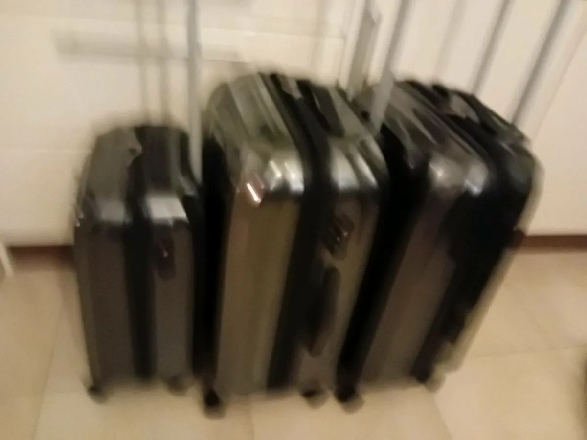 NEW SUITCASES.  X.   3