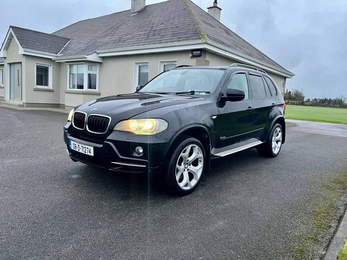 2008 X5 Commercial - Image 2