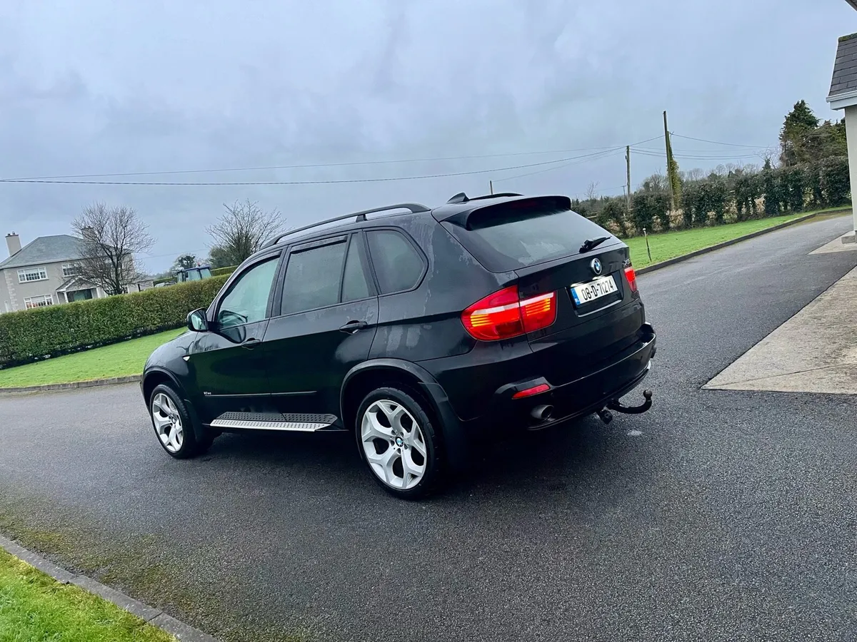 2008 X5 Commercial - Image 4