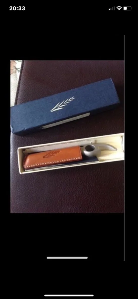 Corkscrew & Bottle Opener in Leather Case - Image 1