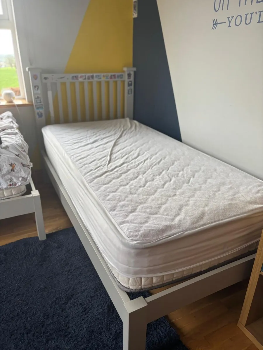 2 single bed frames and mattresses