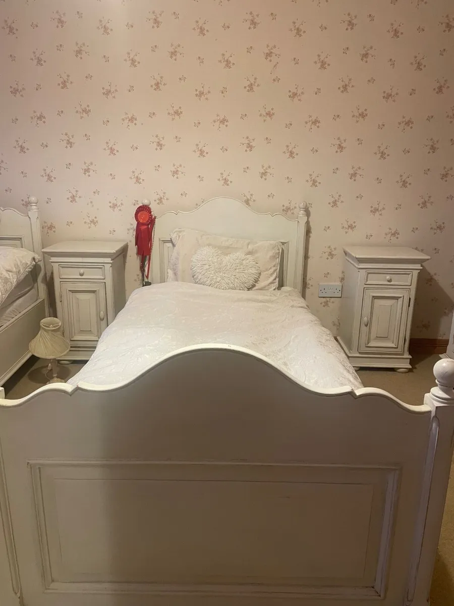 Two Laura Ashley beds and two bedside tables