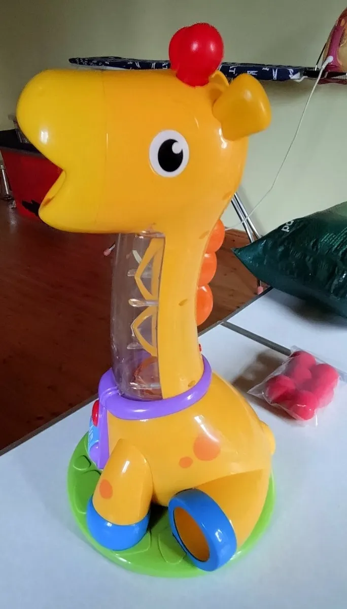 Spin & Giggle Tall Plastic Giraffe Toy, For Kids. - Image 1