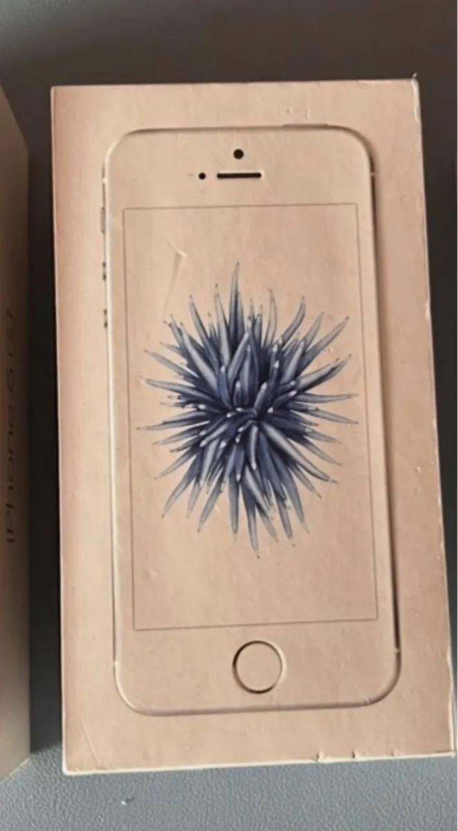 Mint condition IPhone SE in original box + extras - Image 1