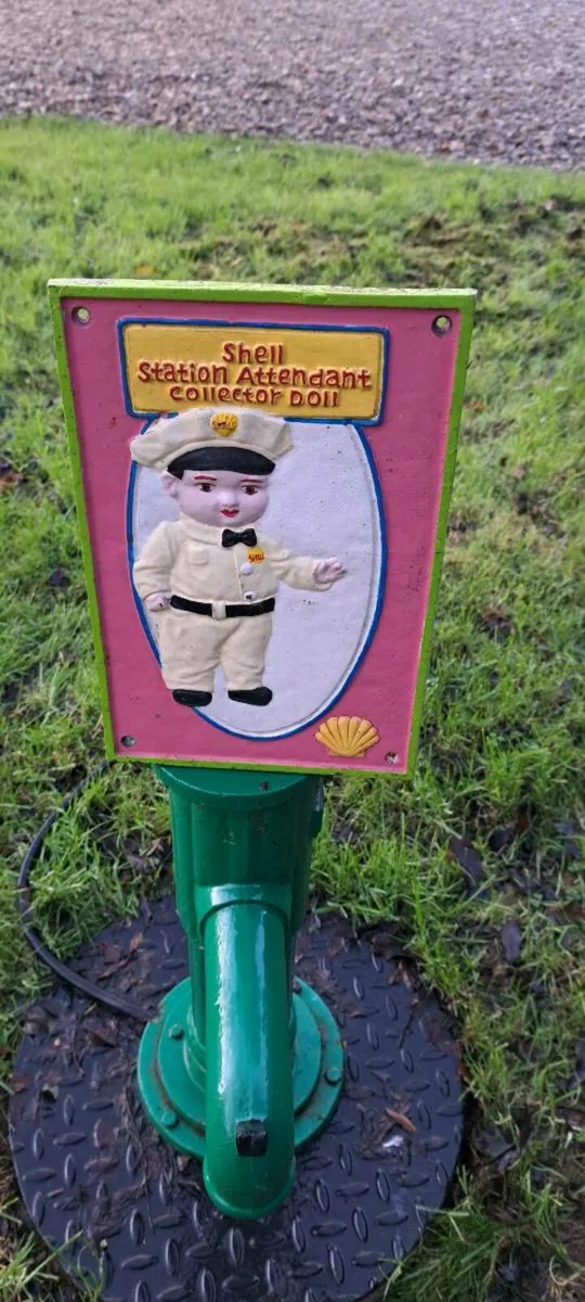 Shell cast iron sign