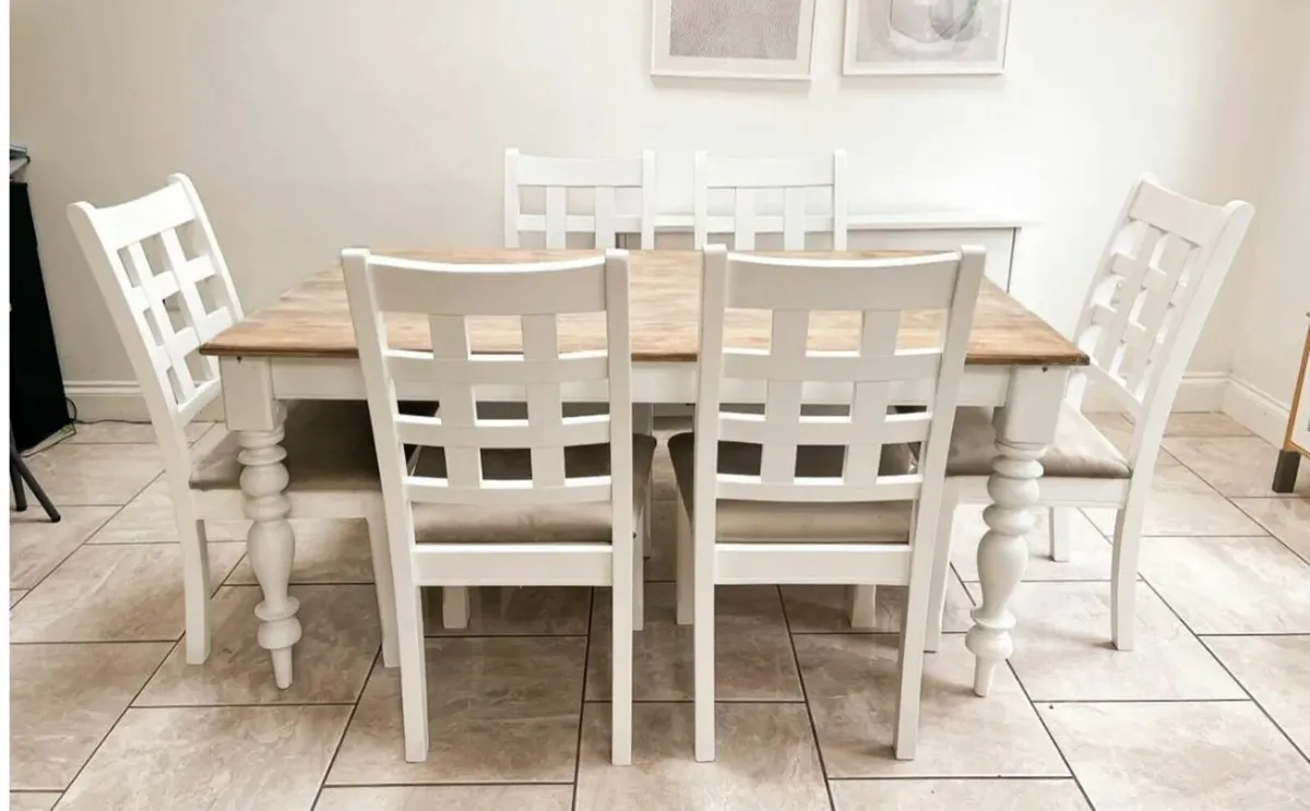Used solid wood dining table with 6 matching chair - Image 1