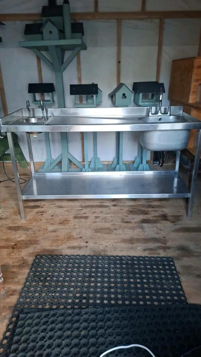 Stainless steel double sink and shelf unit