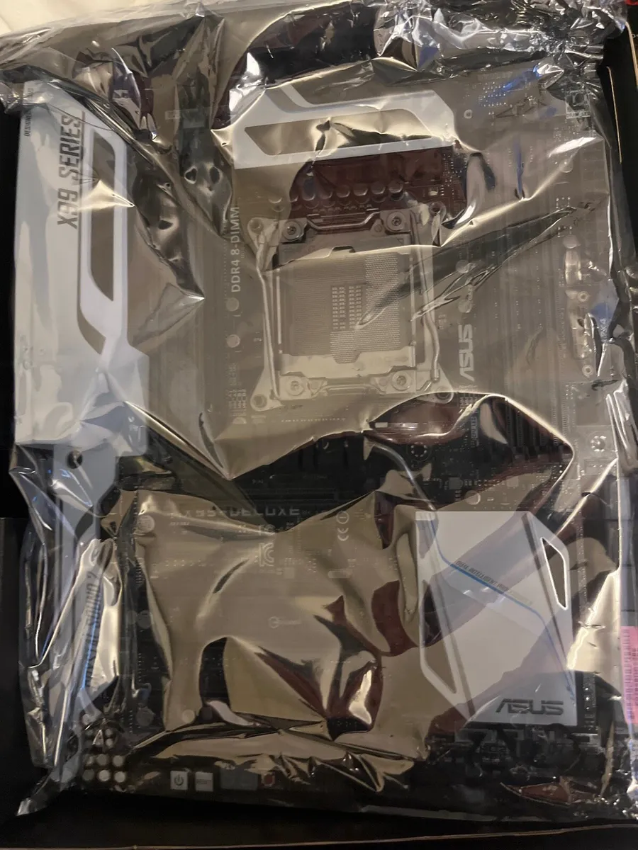 ASUS X99-DELUXE motherboard. - Image 1