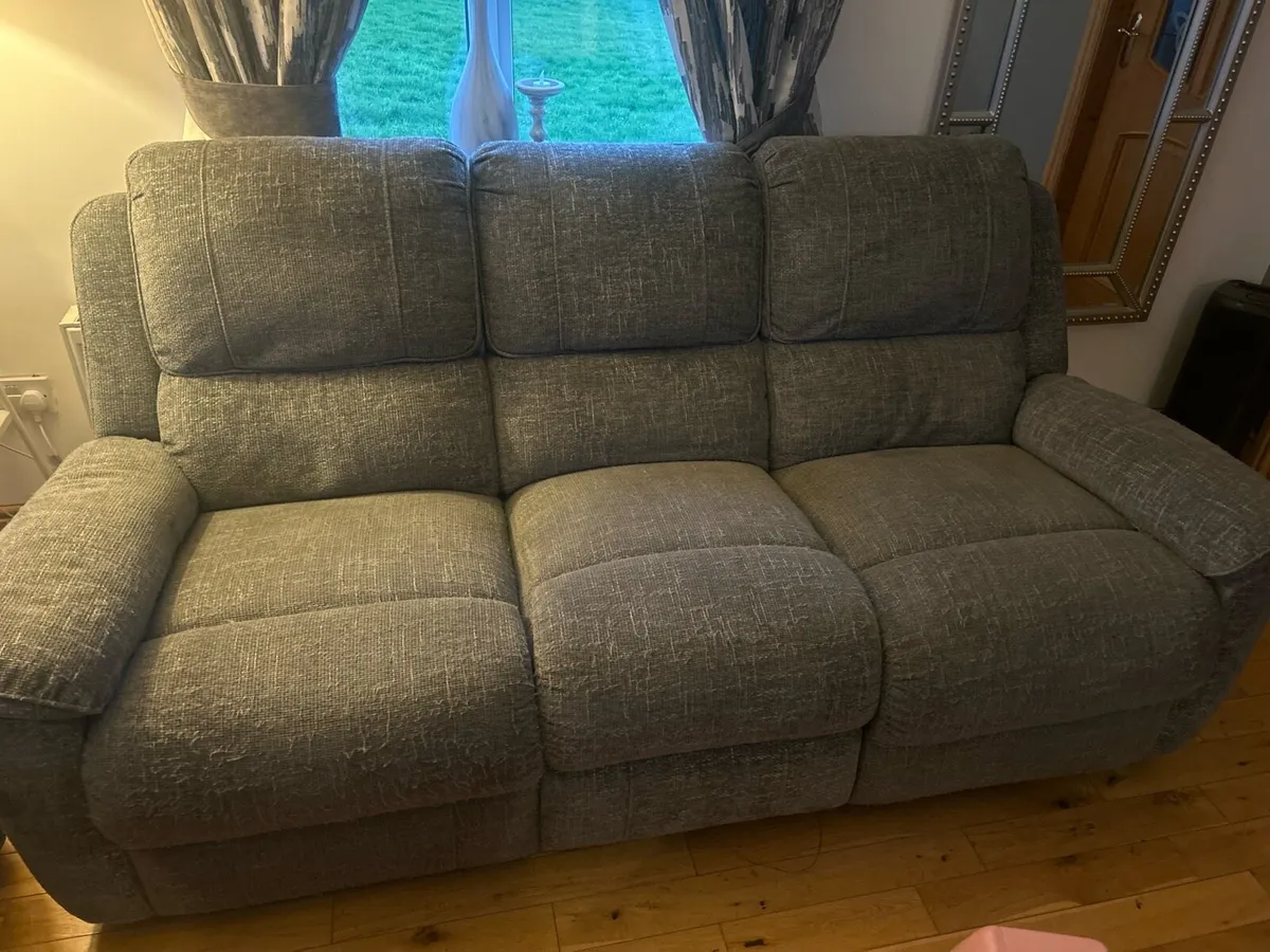 Grey sofa 3 seater recliner and 2 chairs recliners - Image 3