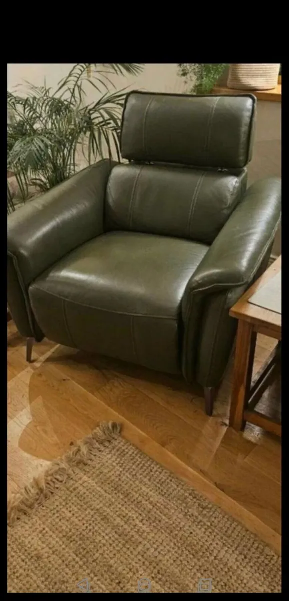 **CLEARANCE**  Demo  Leather Powered Recliner - Image 1