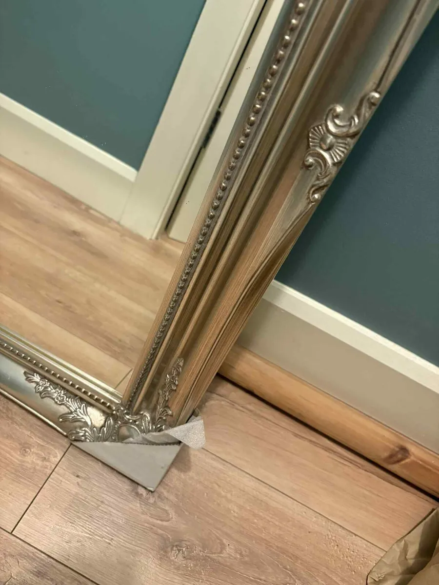 Ornate framed mirror