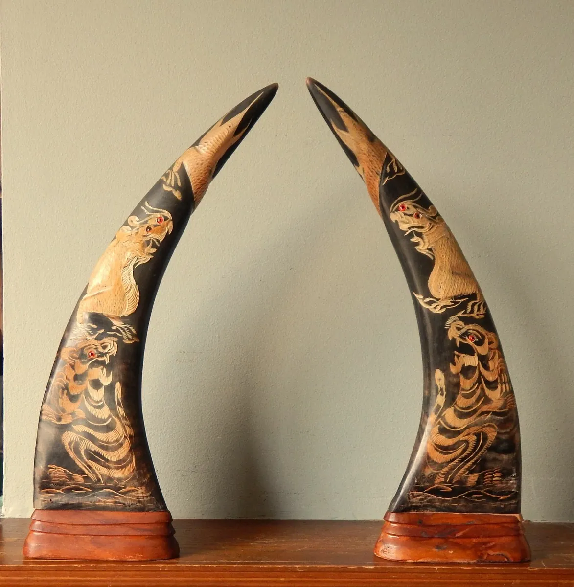 Pair of Horns on Wood Base with Chinese Decoration - Image 1