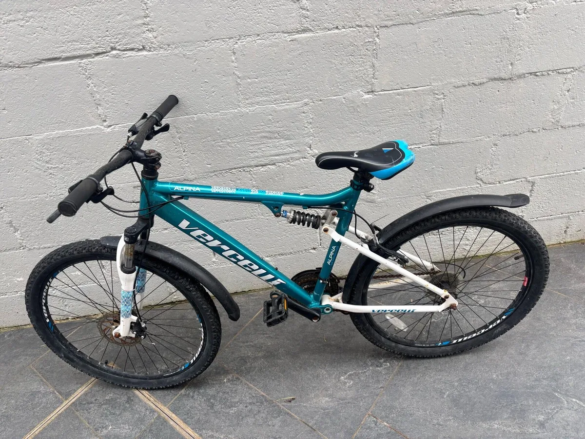 Turquoise Mountain Bike - Image 1