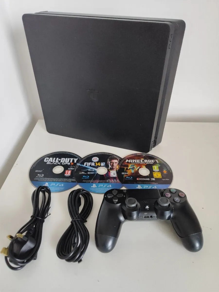 Sony PlayStation 4 Slim | PS4 + 3 Game Disk - Image 1