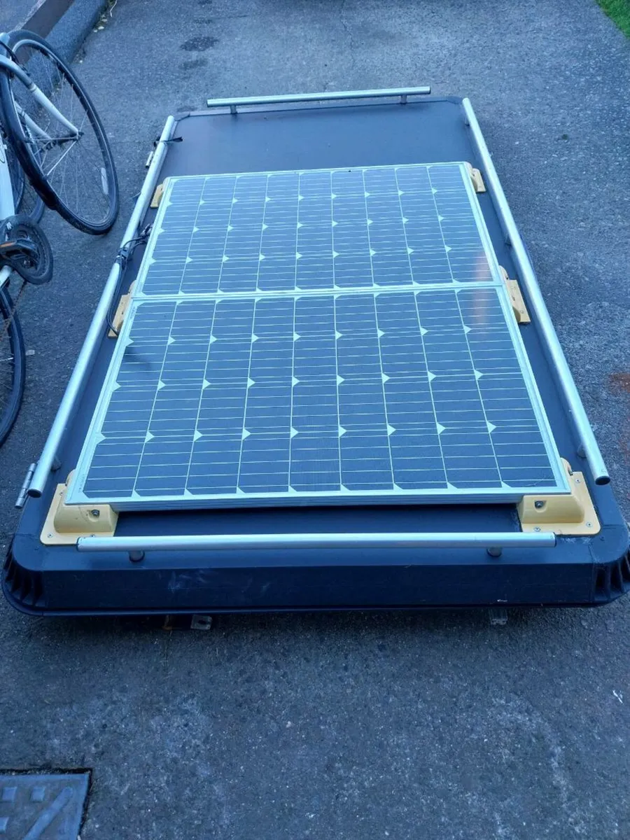 Roof top tent with solar panels - Image 1