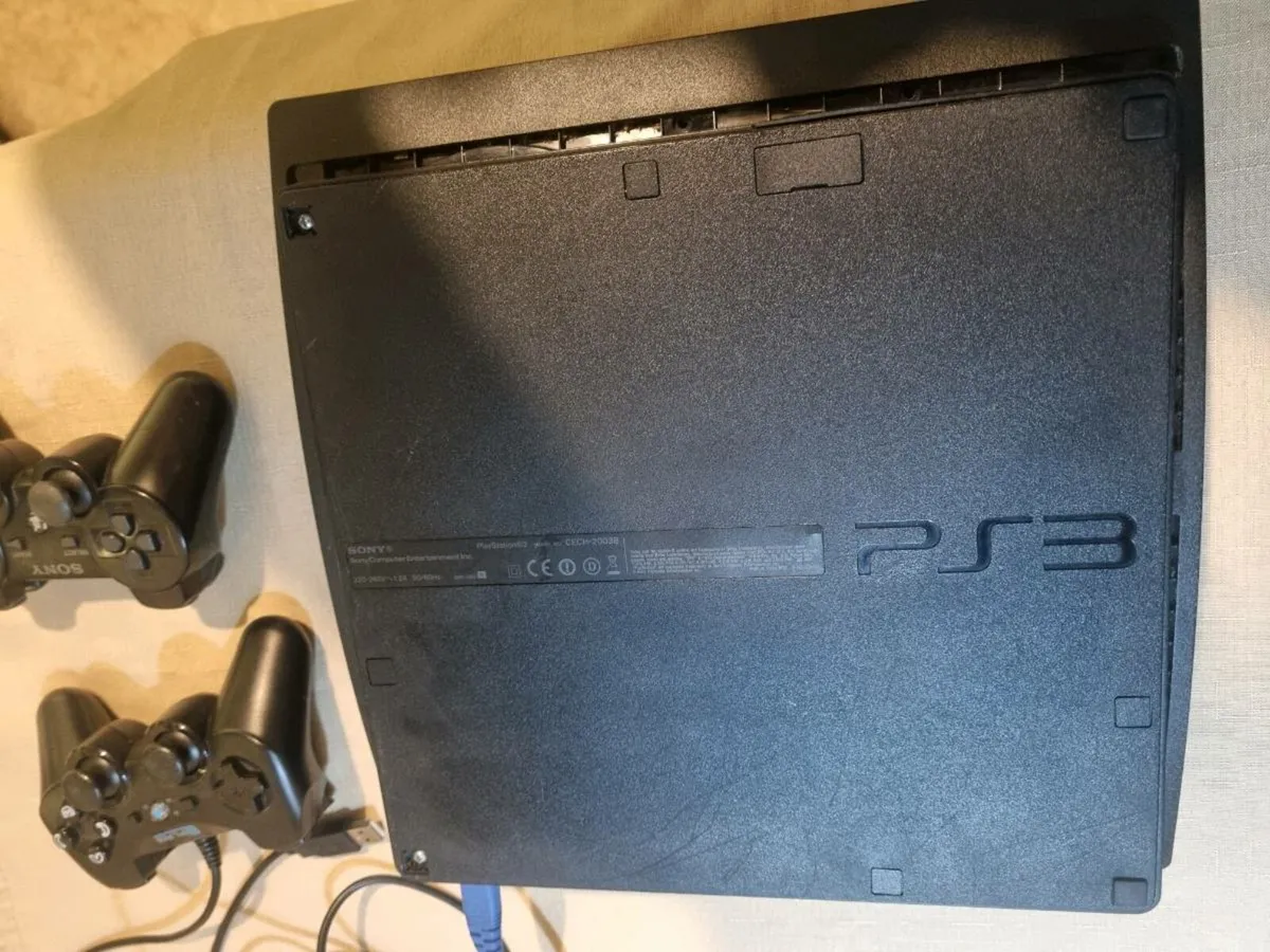 PlayStation 3 Slim Bundle – 2 Controllers + 8 Game - Image 3