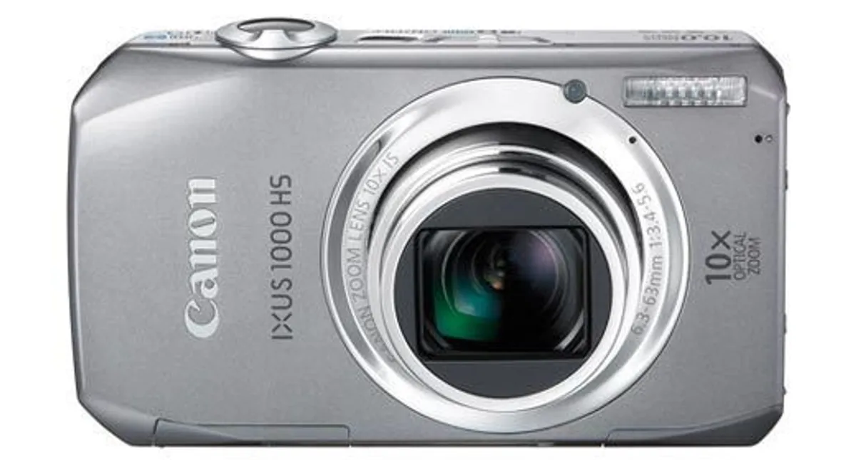 Canon IXUS 1000 HS Digital Camera (High Sensitivity 10 Megapixel, 10x Zoom, 3.0 inch LCD Screen) - Silver - Image 1