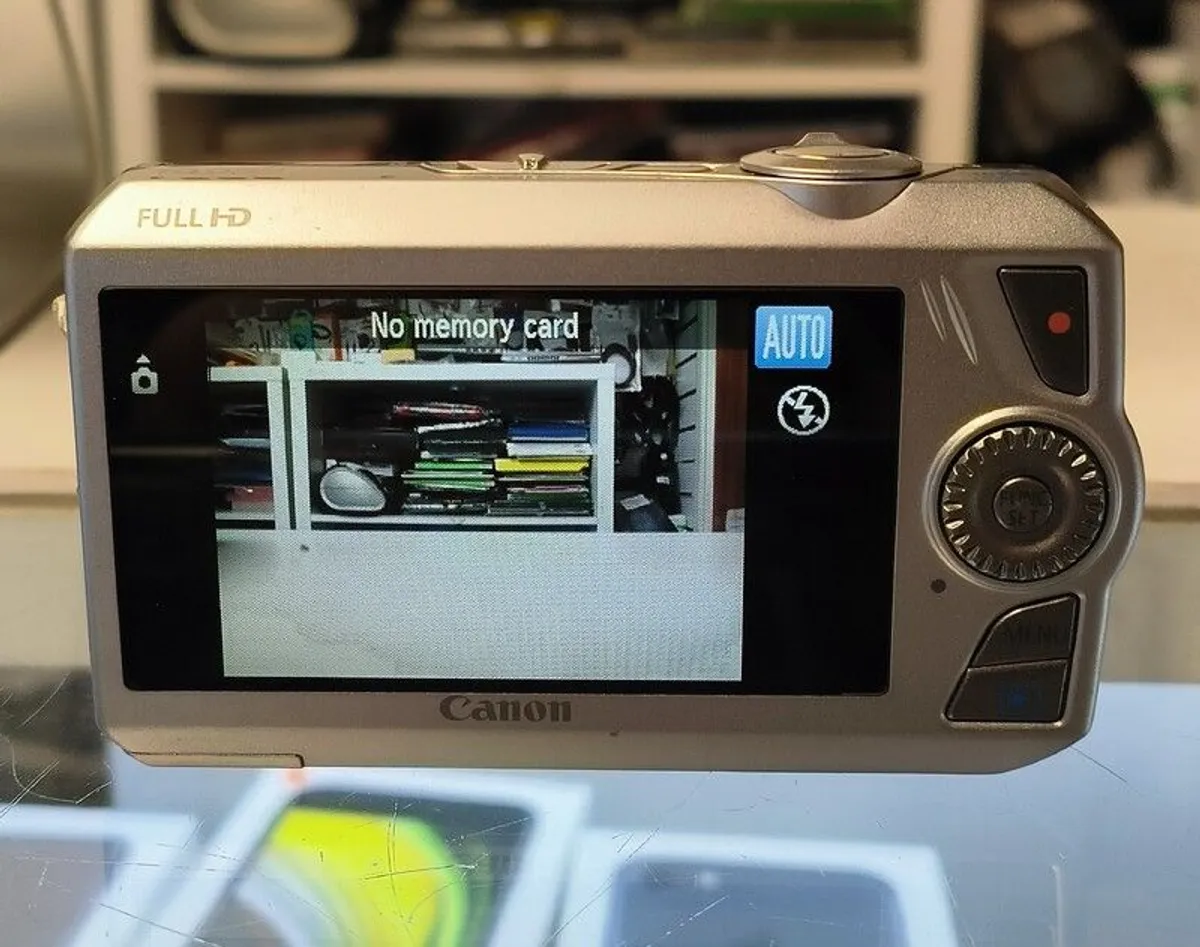 Canon IXUS 1000 HS Digital Camera (High Sensitivity 10 Megapixel, 10x Zoom, 3.0 inch LCD Screen) - Silver - Image 2