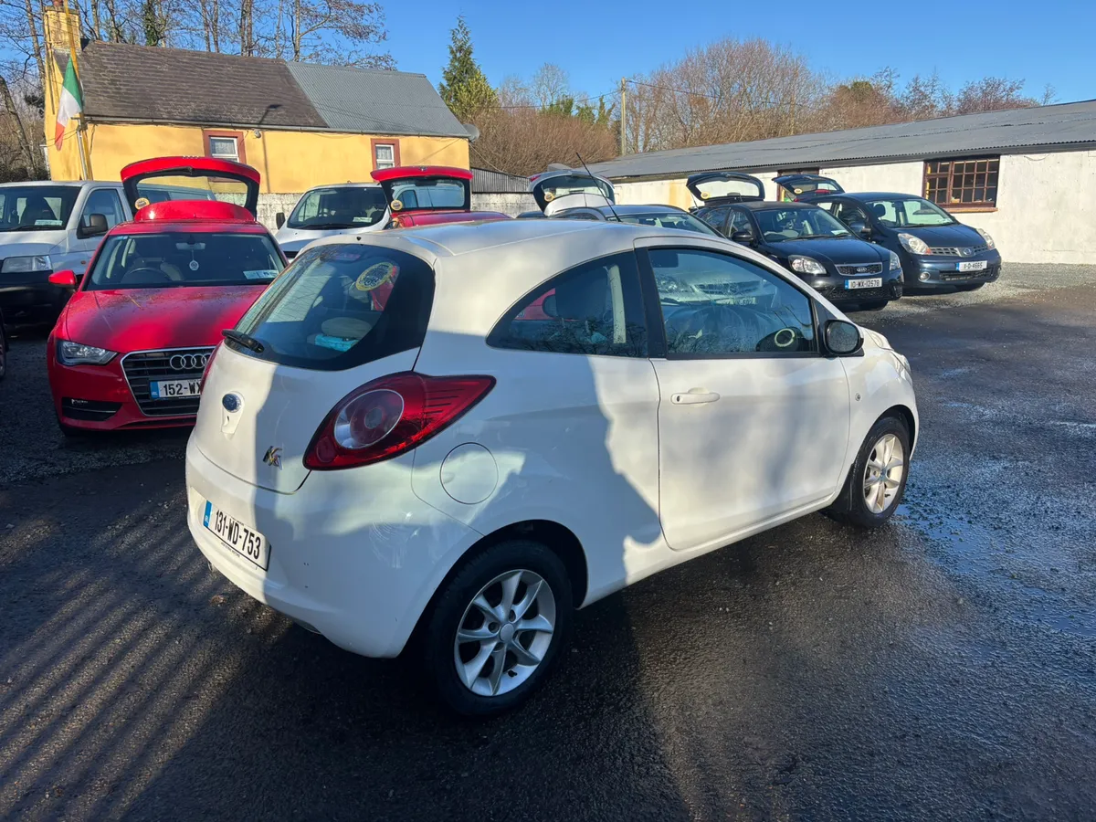 Lovely Low MLS Ice White Ford KA - Image 4