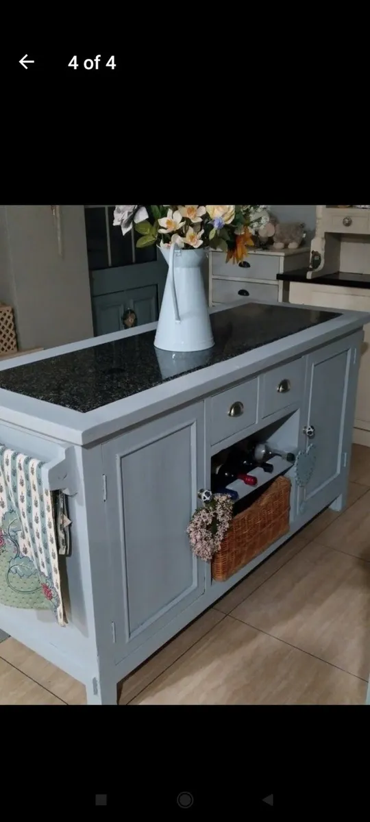 Solid kitchen island with granite top