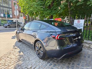 2024 (242) Tesla Model 3 AWD Long Range - Image 2