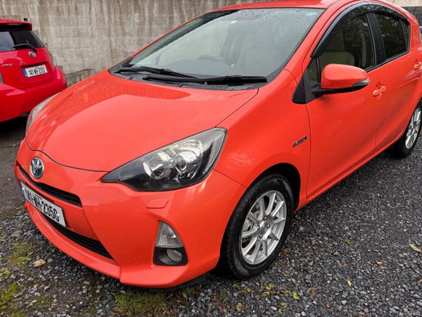 Toyota Aqua Hatchback, Petrol Hybrid, 2014, Orange