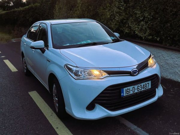 Toyota Corolla Saloon, Petrol Hybrid, 2016, White