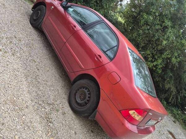 Toyota Corolla Saloon, Petrol, 2003, Red
