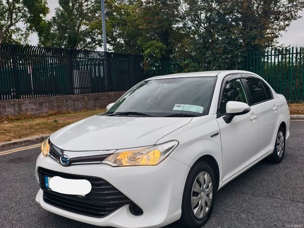 Toyota Corolla Saloon, Petrol Hybrid, 2016, White