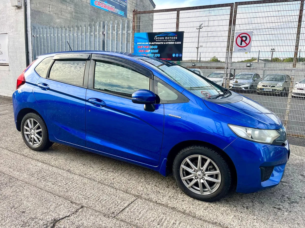 Honda Fit 2015 hybrid  half leather - Image 2