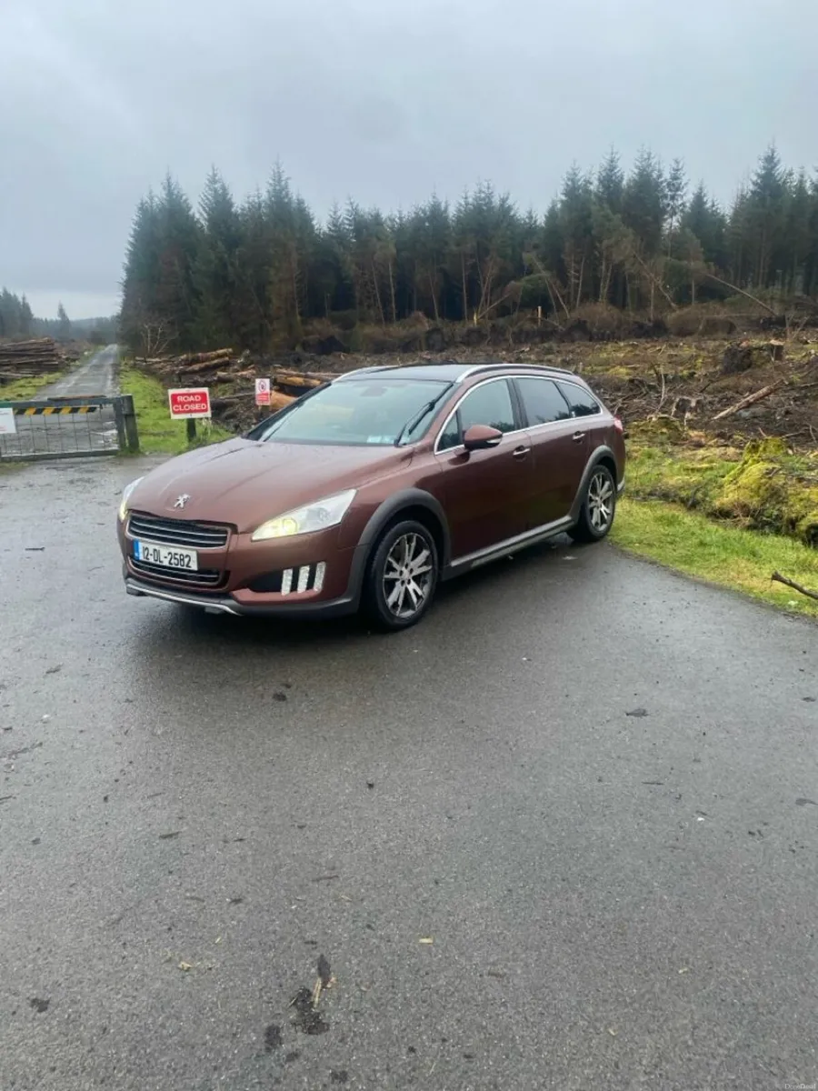 Peugeot 508 2012 4wd auto diesel hybrid tested - Image 1