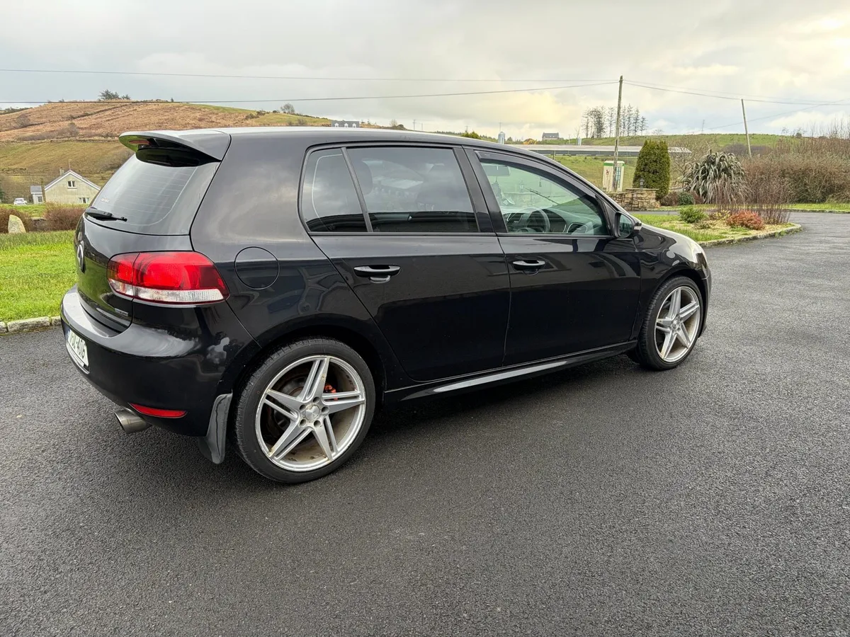 Black Volkswagen Golf - Image 1