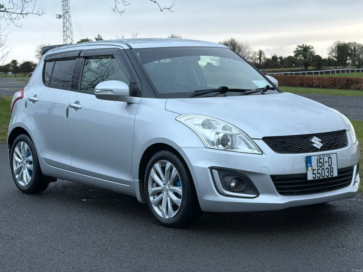 Suzuki Swift 2015 GLX 1.2 Automatic hybrid - Image 1