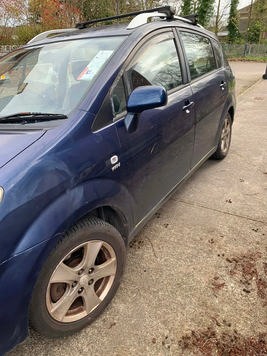 Toyota Corolla blue 2004 7 seater - Image 3