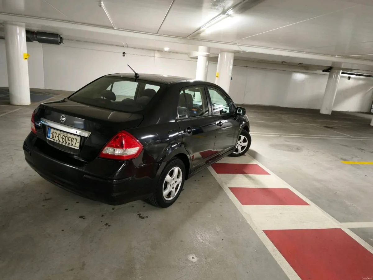 Nissan tida very low km - Image 2