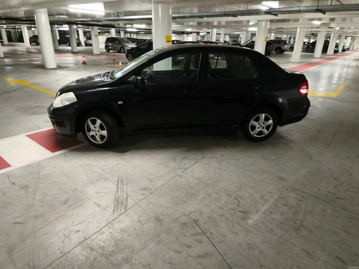 Nissan tida very low km - Image 4