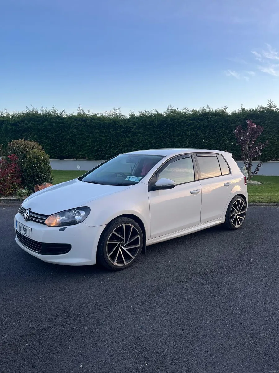 2011 White Volkswagon golf - Image 1