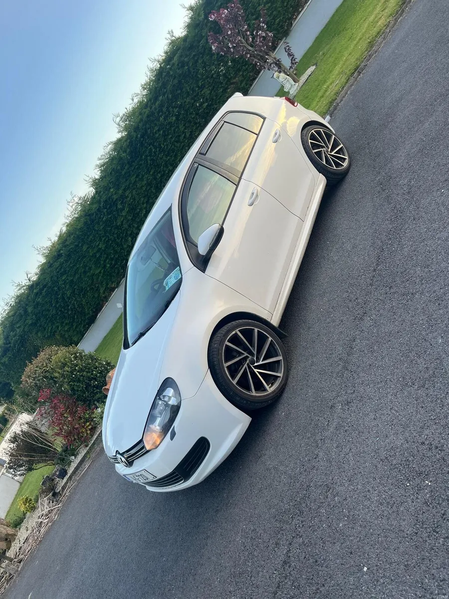 2011 White Volkswagon golf - Image 2