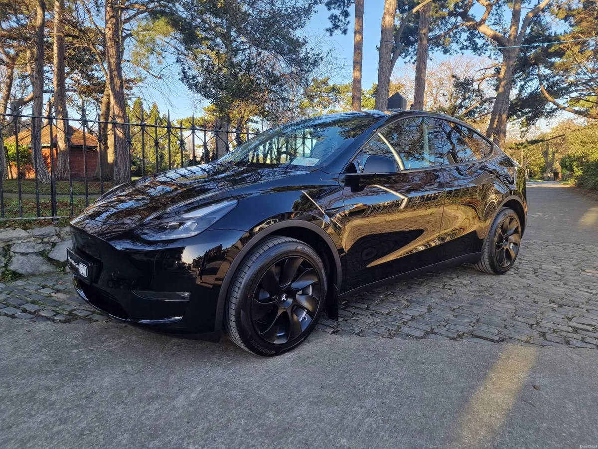 2024 (241) Tesla Model Y AWD Long Range - Image 1