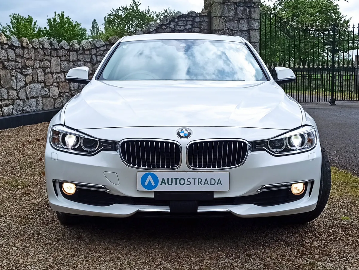 151 BMW 320d luxury • Black Leather - Image 2