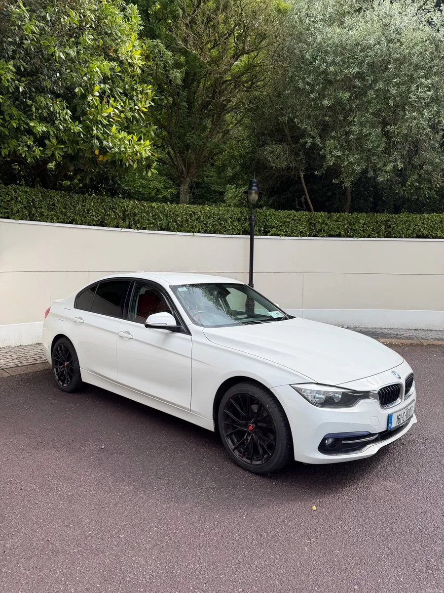 White BMW 3 series - Image 1
