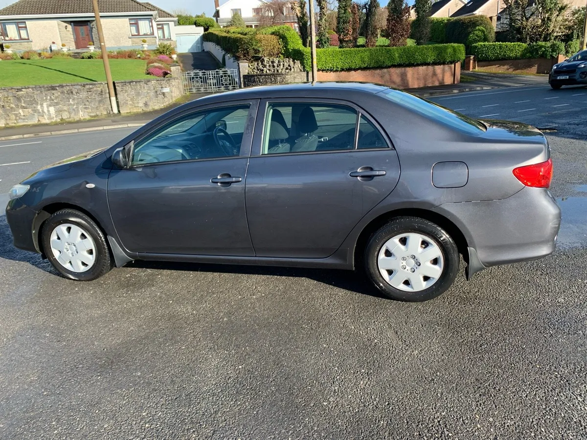Grey Toyota Corolla 1.4 Terra Petrol Saloon. - Image 3