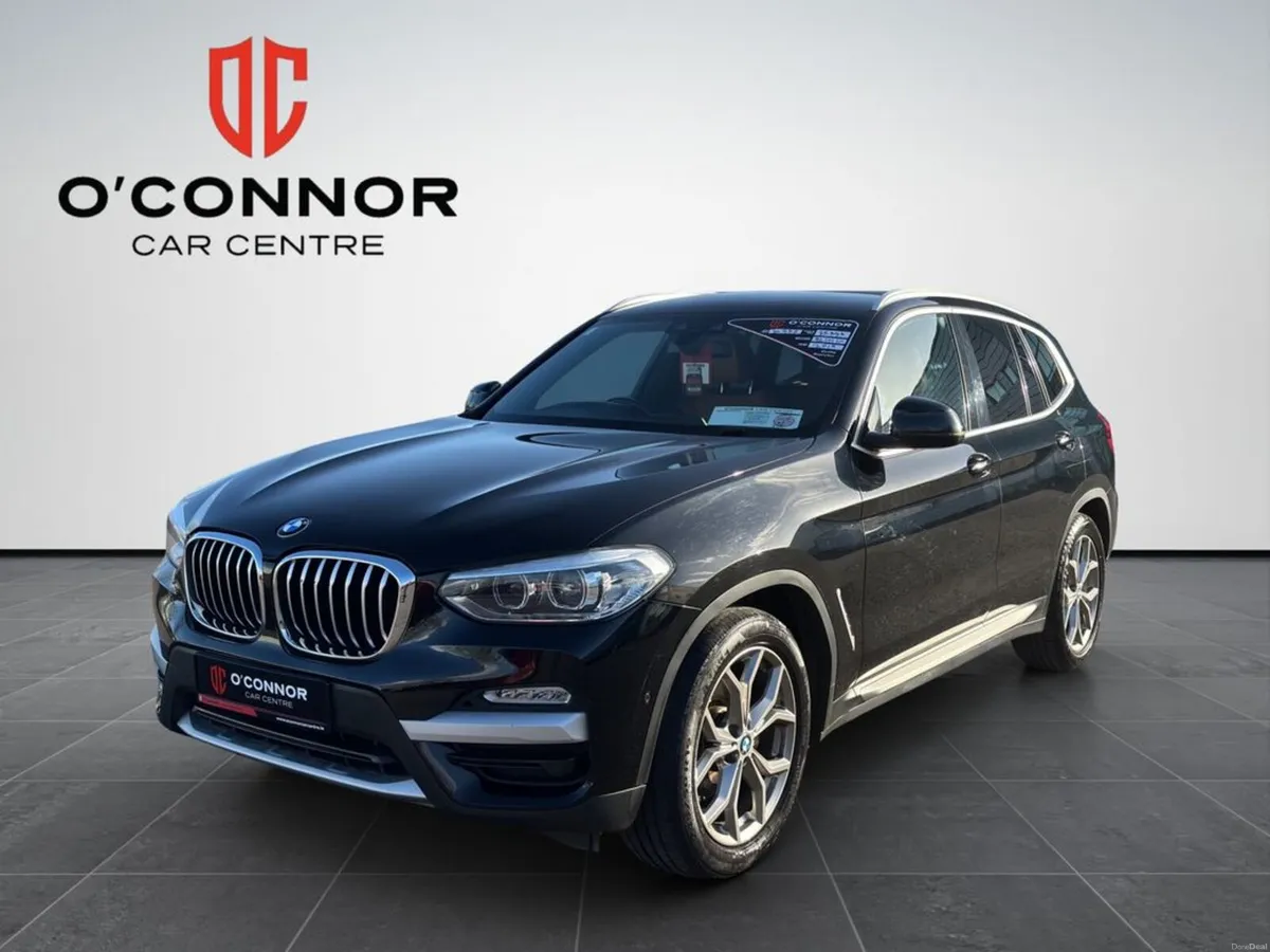 BMW X3 Black on the outside, tan on the inside… th - Image 1