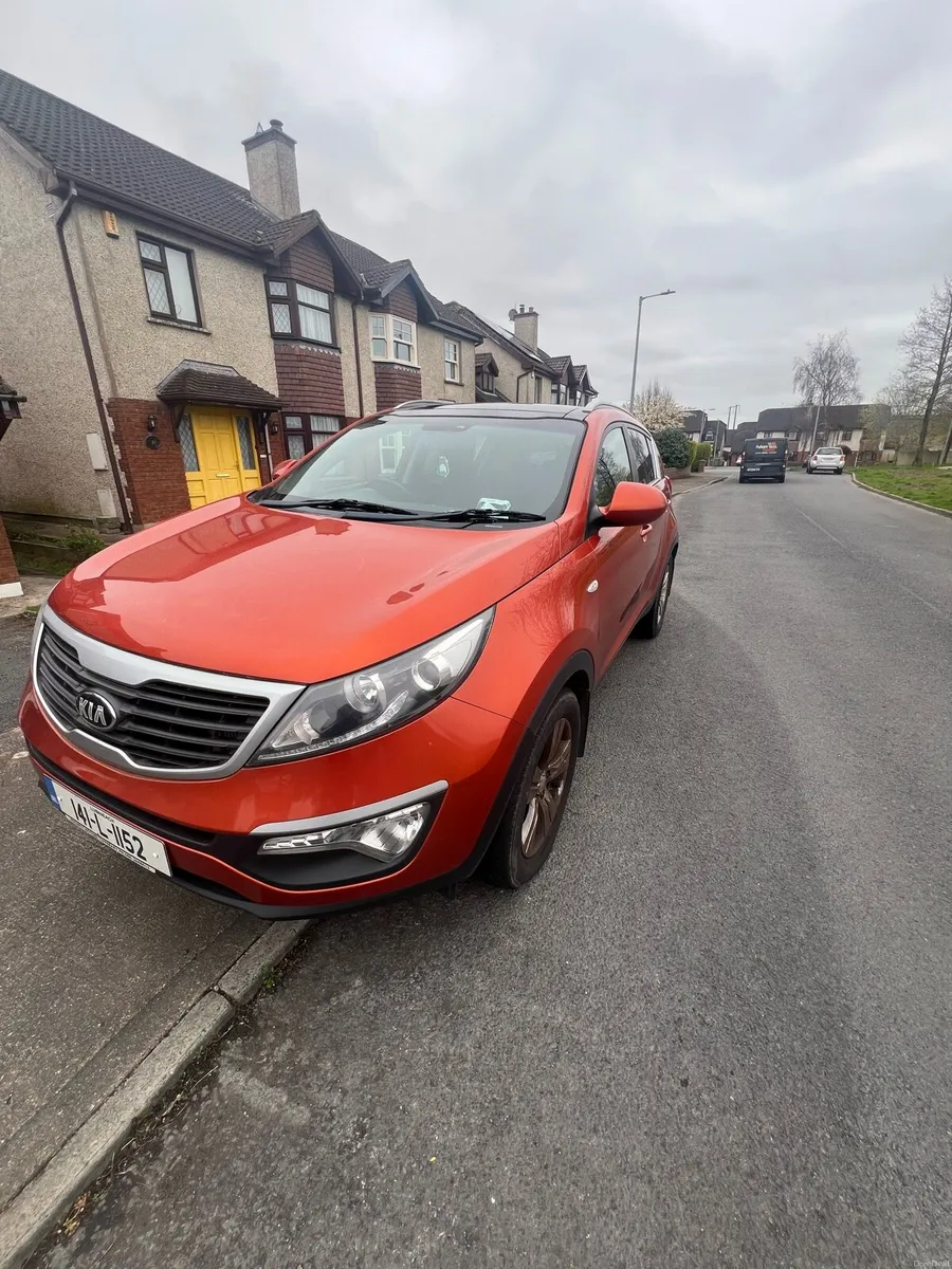 Kia Sportage 2014 orange manual - Image 1
